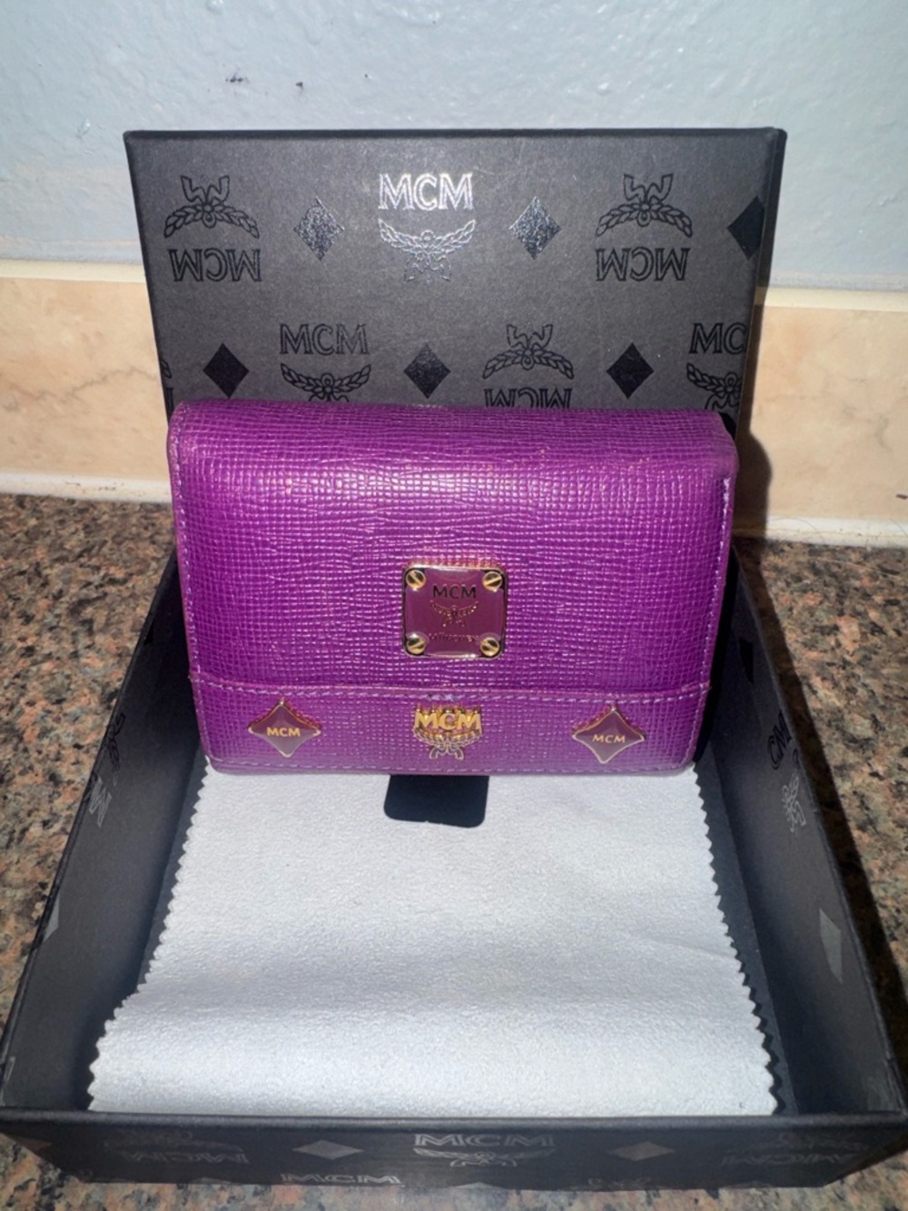 MCM limited edition Purple Leather Wallet with lion charms full inclusion. EUC